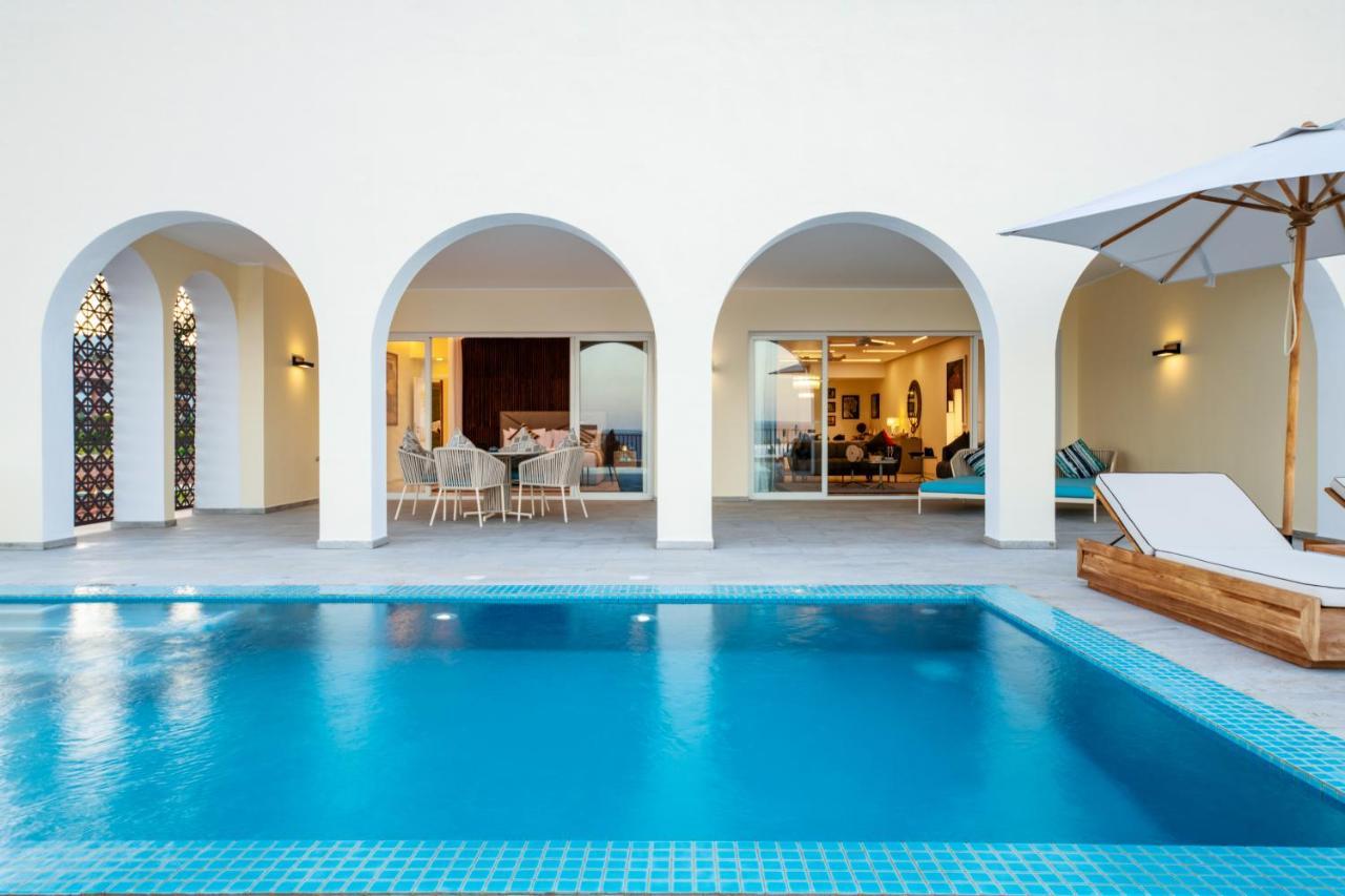 The Mora Zanzibar Hotel Matemwe  Exterior photo A pool at the hotel