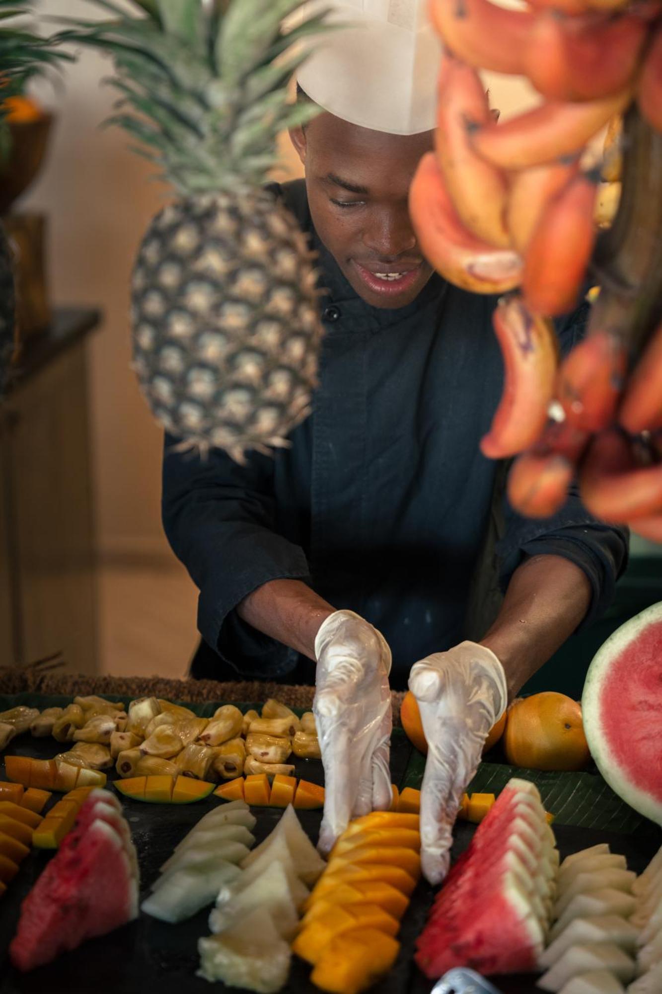 The Mora Zanzibar Hotel Matemwe  Exterior photo A chef preparing fruit